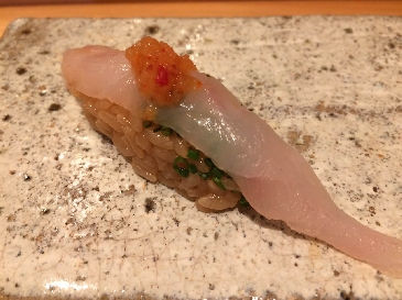 A photo of fugu nigiri